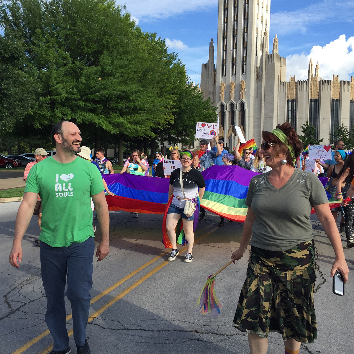 Rev. Marlin Lavanhar and a group from All Souls march in Tulsa's Pride Parade in downtown Tulsa.
