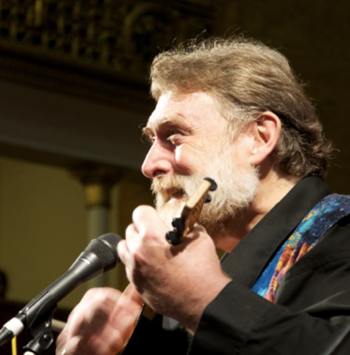 Singer songwriter Nick Page playing the ukelele