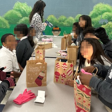 Children enjoying Christmas Gifts.